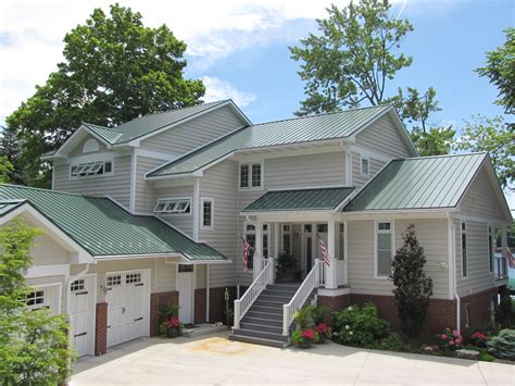 white houses with green metal roofs|green roof house color schemes.